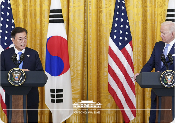 President Moon Jae-in speaks as U.S. President Joe Biden watches during their joint news conference in the White House on Friday (EST). (Courtesy of Cheong Wa Dae)