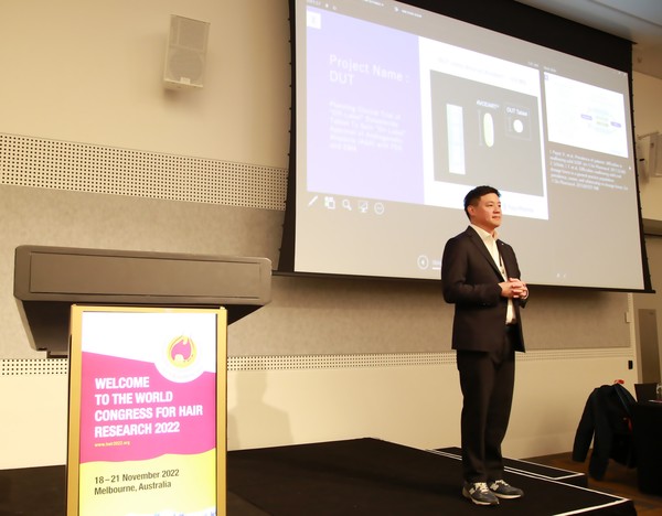 Yuyu CEO Yu Wan-sang presents the company's plan to develop a smaller dutasteride treatment for hair loss during the World Congress for Hair Research 2022 held in Melbourne, Australia, from last Friday to Monday.