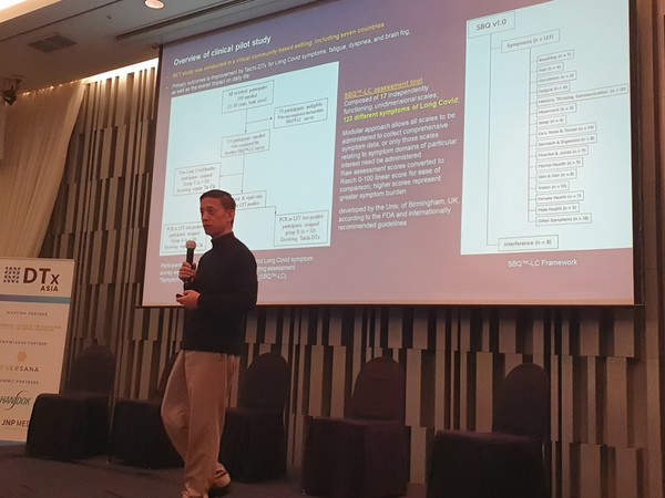 Dr. Tim Shi explains the pilot clinical trial for treating long Covid symptoms with a Tai Chi digital therapeutic (DTx) at DTx Asia in Seoul on Nov. 9.