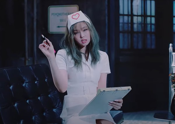 A scene of K-pop group Blackpink’s music video of the new song “Lovesick Girls” portrays a nurse wearing a nurse cap and a tight, short skirt. (Captured from YouTube)