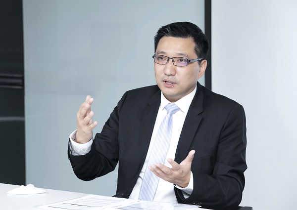 Johny Tse, general manager of Roche Diagnostics Korea, speaks during an interview.