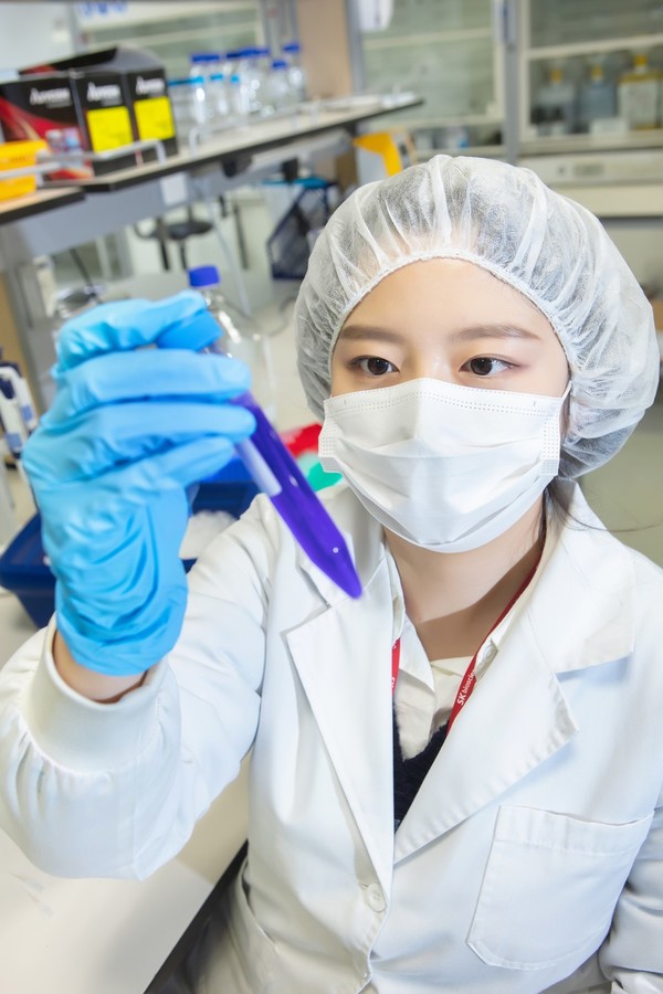 A researcher at SK Bioscience works at a lab to develop a Covid-19 vaccine.