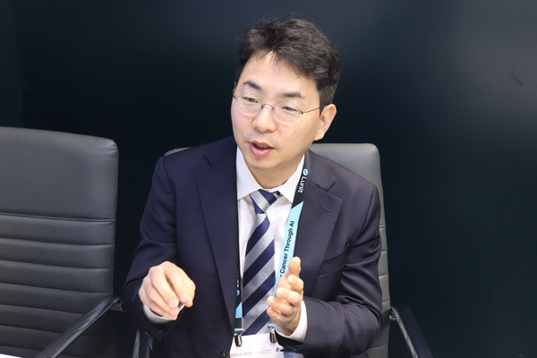 Lunit's Chief Medical Officer (CMO) Kim Ki-hwan explains the significance of the company’s studies and future goals during an interview with Korea Biomedical Review at the RSNA 2022 congress at the McCormick Place Convention Center in Chicago, Ill., on Monday.