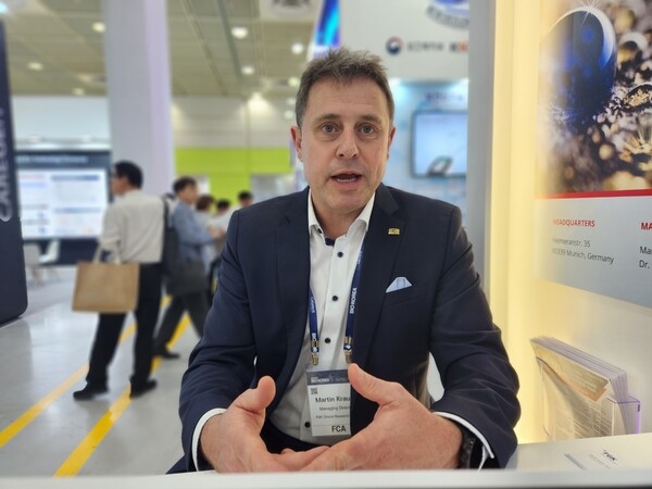 FGK’s Managing Director Martin Krauss speaks to Korea Biomedical Review in an interview about his company's reason for attending the conference at COEX, Seoul at BIO Korea 2023 on Friday. 