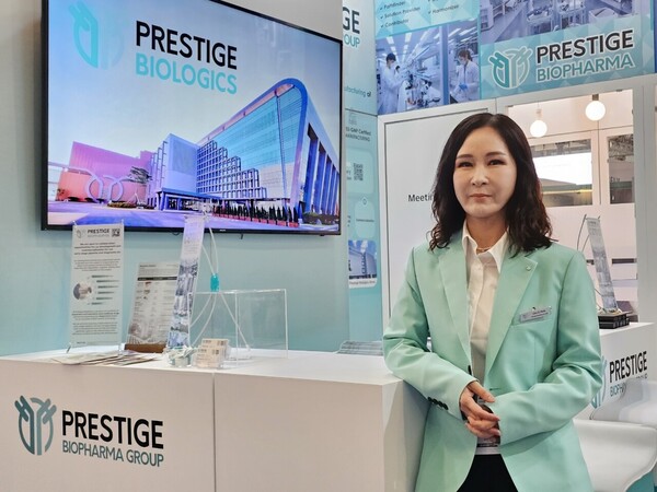 Lisa Soyeon Park, CEO of Prestige Biopharma Group, at the company’s booth at BIO 2023