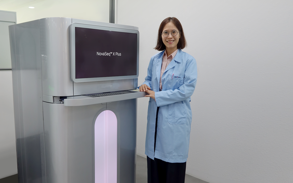 Seo Go-hun, Chief Medical Officer (CMO) and Lab Director at 3billion, poses in front of a NovaSeq X after installation.