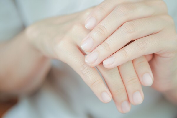 One of the common problems with chemotherapy for breast cancer is that it can cause nails to become brittle or discolored. Sometimes, the nails become very thin and break; sometimes, they become thick, like an athlete's foot. How can one prevent these nail problems? (Credit: Getty Images)