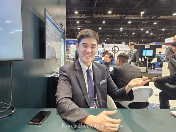 Lee Sang-hyup, Lunit's Vice President of the Medical Directives Department, explains his role within the company and the company's goals at the sidelines of the RSNA 2023  at the McCormick Place Convention Center in Chicago, Ill., on Sunday.